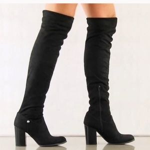 Guess “Dandra” over the knee boots
